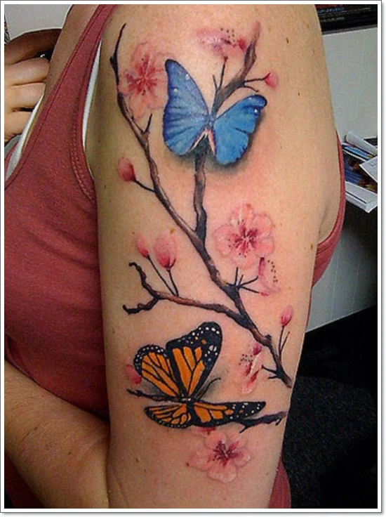 blue tattoo and monarch 