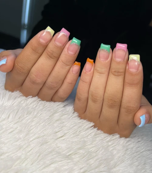 Colorful orange, green, yellow, pink and blue French tip design