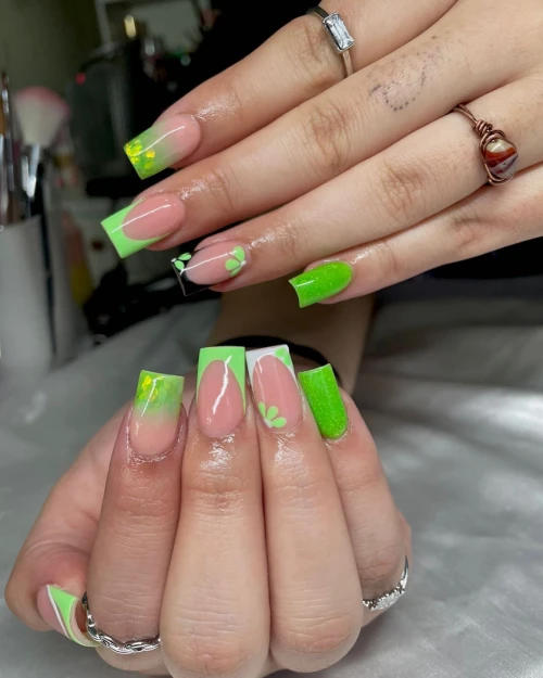 Green nails with yellow floral design ideas are the perfect spring summer French tip design idea