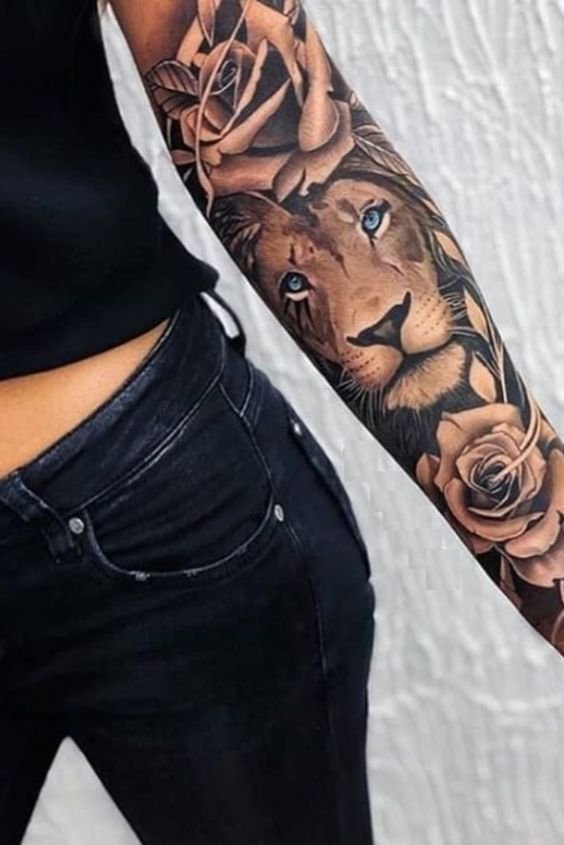 large blue eye lion tattoo with rose