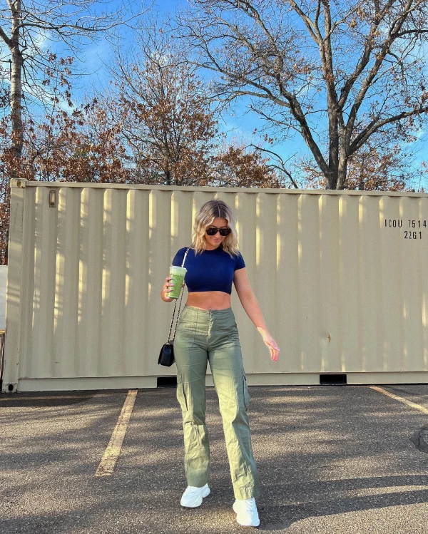 fitted green cargo pants and cropped top