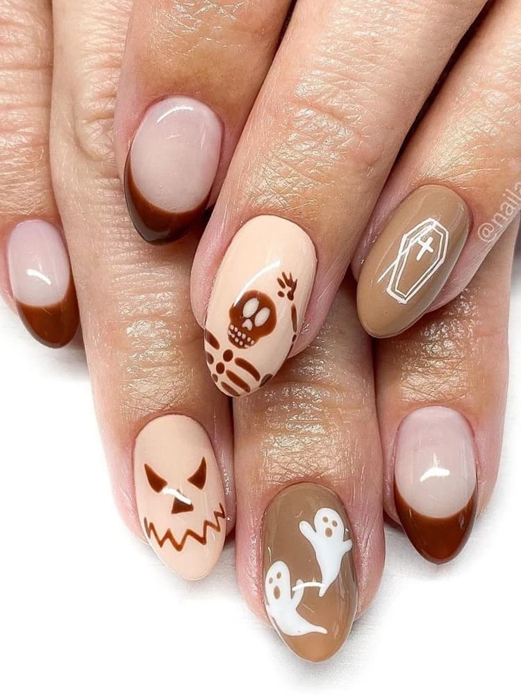 Ghost, Skeletons, coffin on a cute set of short French tip brown nails 