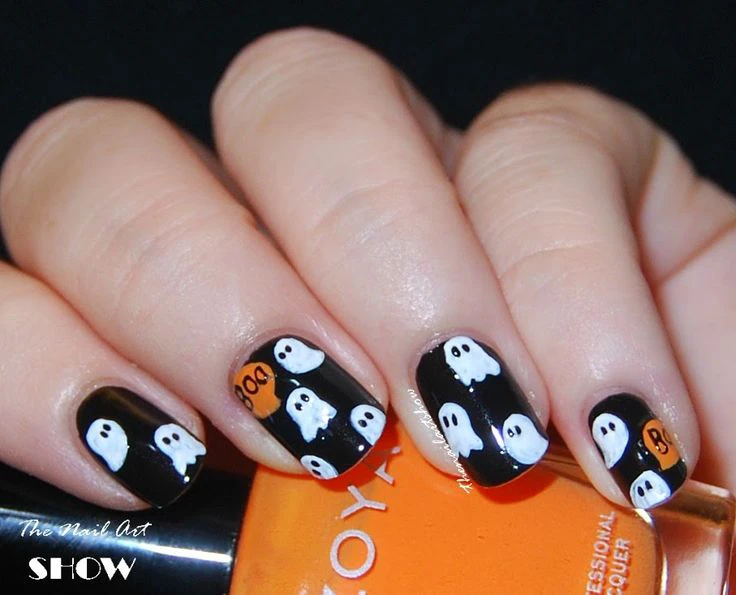 Short black nails with orange boo and white ghost Halloween design
