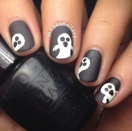 Ghost design on short black and white Nails