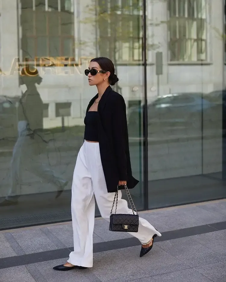 tube top with black blazer over with with wide leg cotton pants