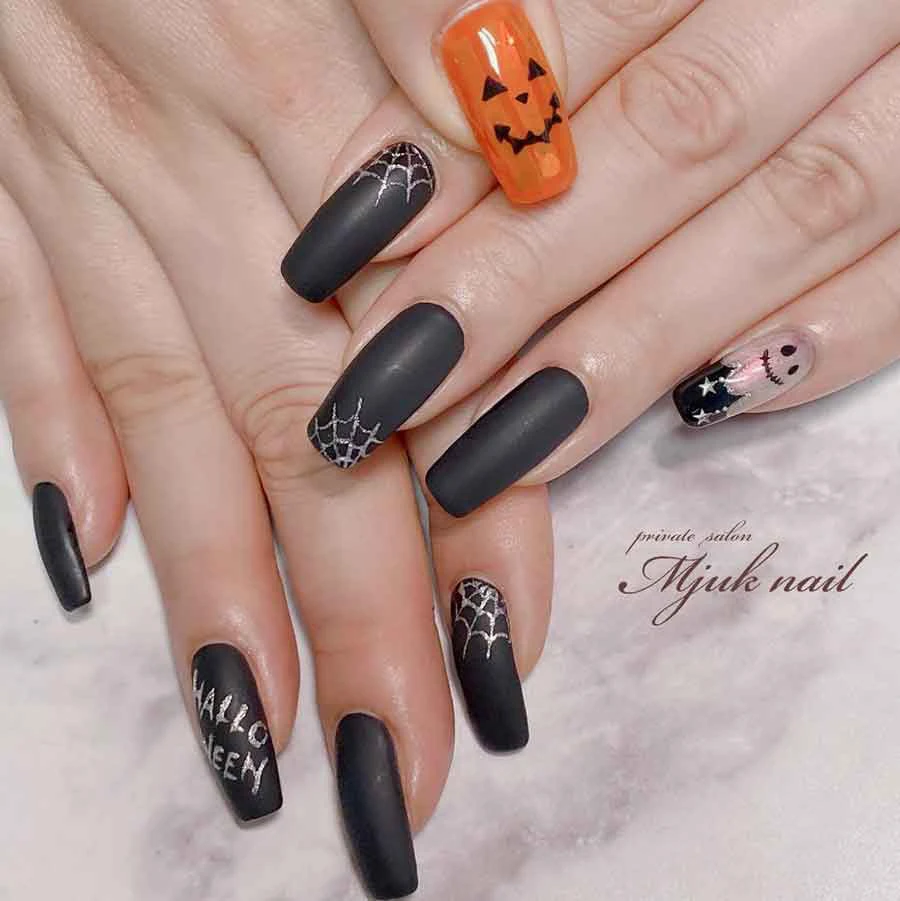 Pumpkin spider matter black and orange spooky nails
