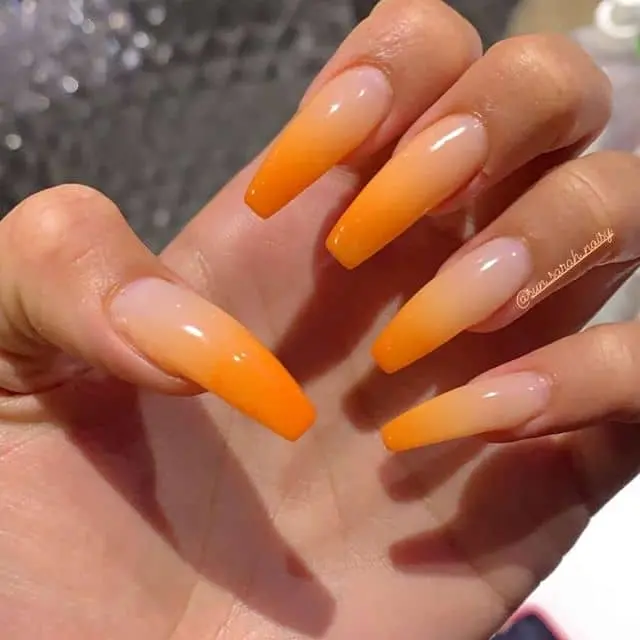 nude and orange nails