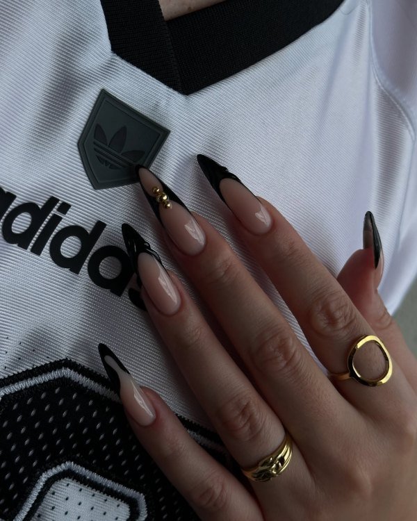 pointy black and gold nail art