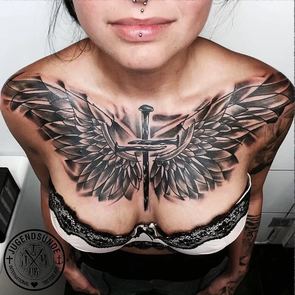 wings with cross tattoo design