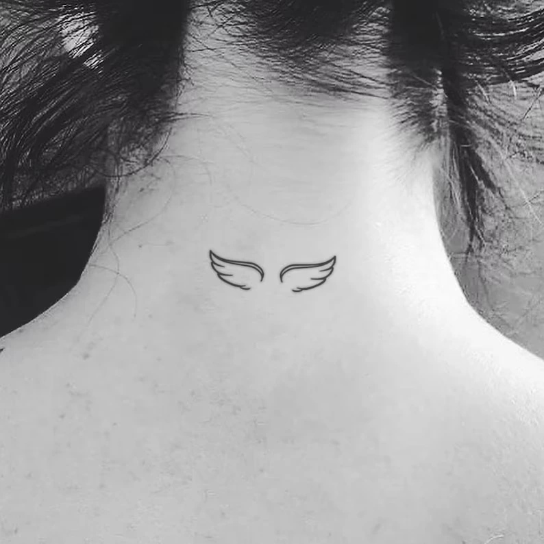 Small tattoo on the back of the neck