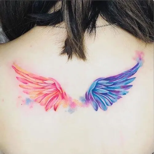 watercolor angel wing ink tattoo