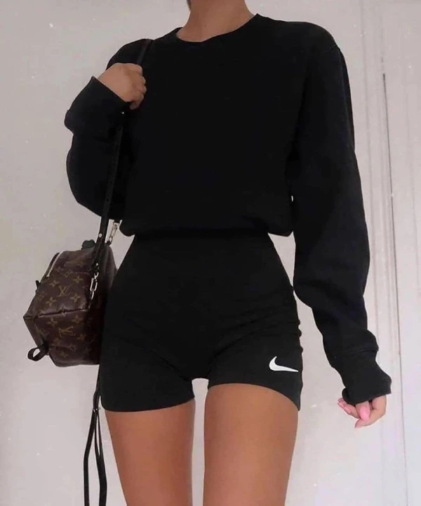 sporty outfit with sweater and biker shorts