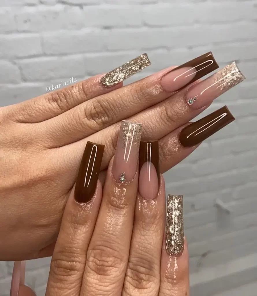 Glitter French nails with rhinestone