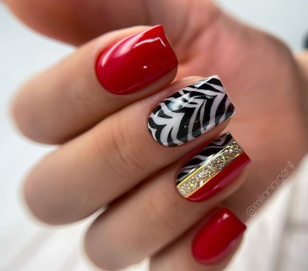 red manicure with print