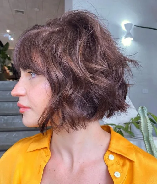 Layered Bob With soft Brown hair with bangs