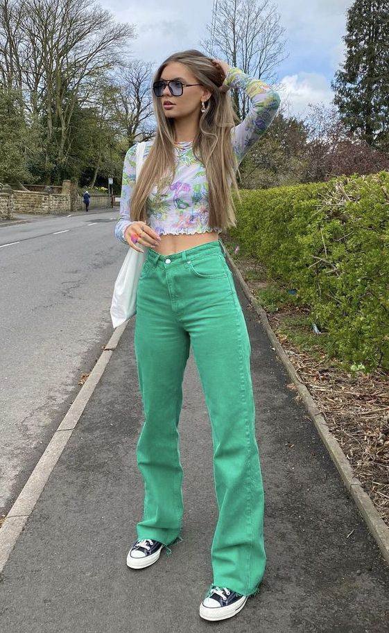 Colorful blouse and green jeans pants