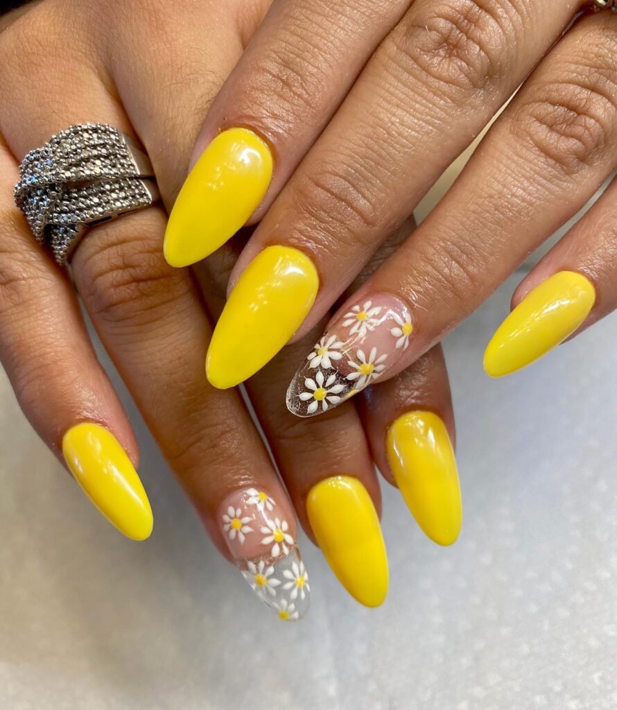 Oval Shape Floral Design Yellow nails with white Flowers design patterns