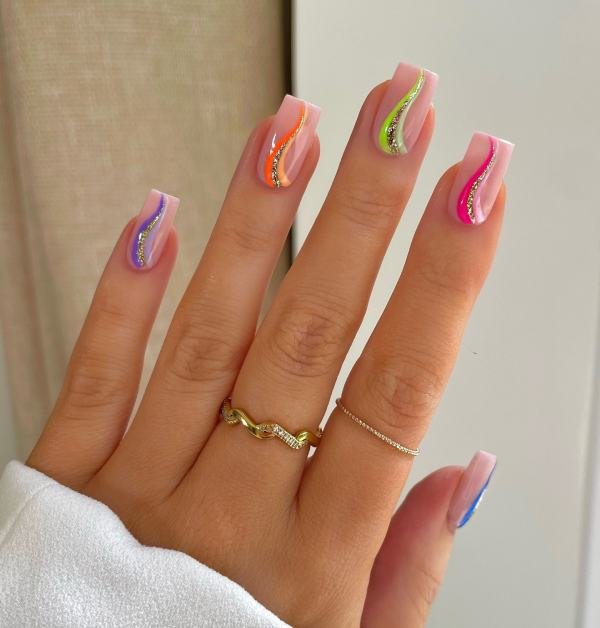 swirly rainbow nail art deisgns to copy. Cute bright color nails for summer look.