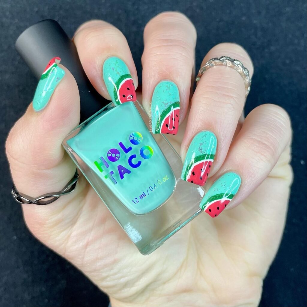 Bright and beautiful watermelon nails perfect for summer days.