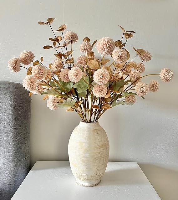 Beige flowers in White Cream vase