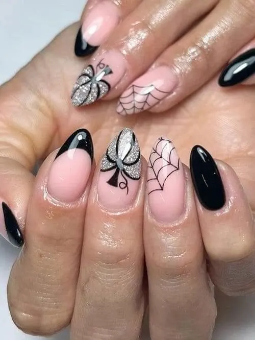 pumpkin nails with spider web