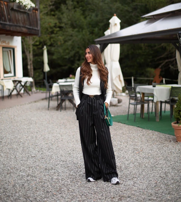 Vest, sweater and matching pants outfit for dinner party