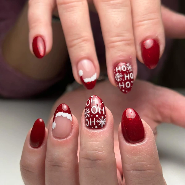 Holiday nails in red with Santa hat