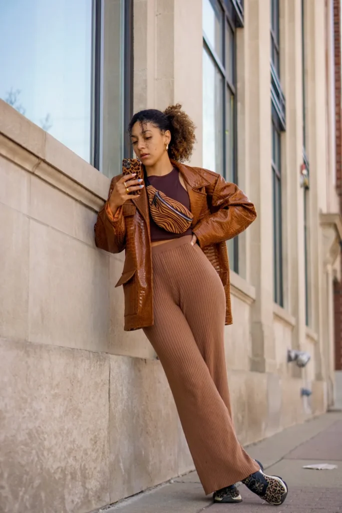 Leather brown Jacket with Loose Sweater Pant and Sneakers