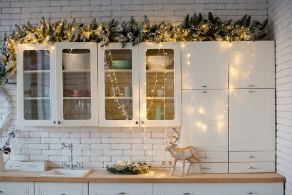 Christmas  Garland above kitchen cabinets