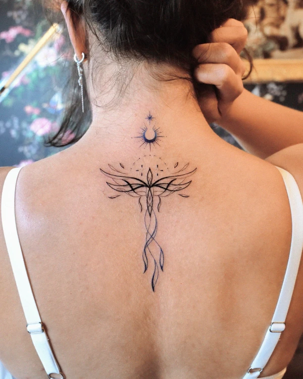 Star, sun, and the Phoenix on the back