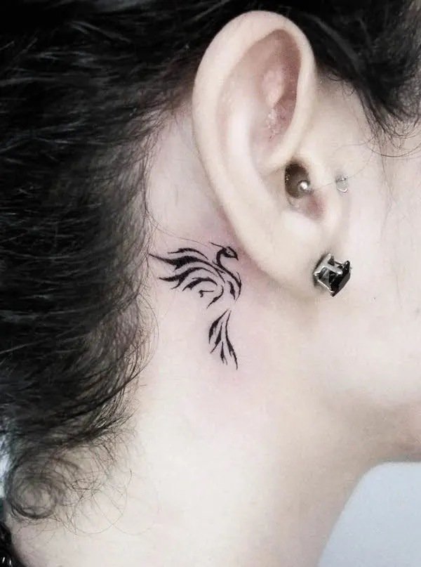 Small phoenix behind the ear