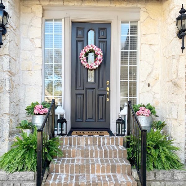 Spring decor with pink front door wreath