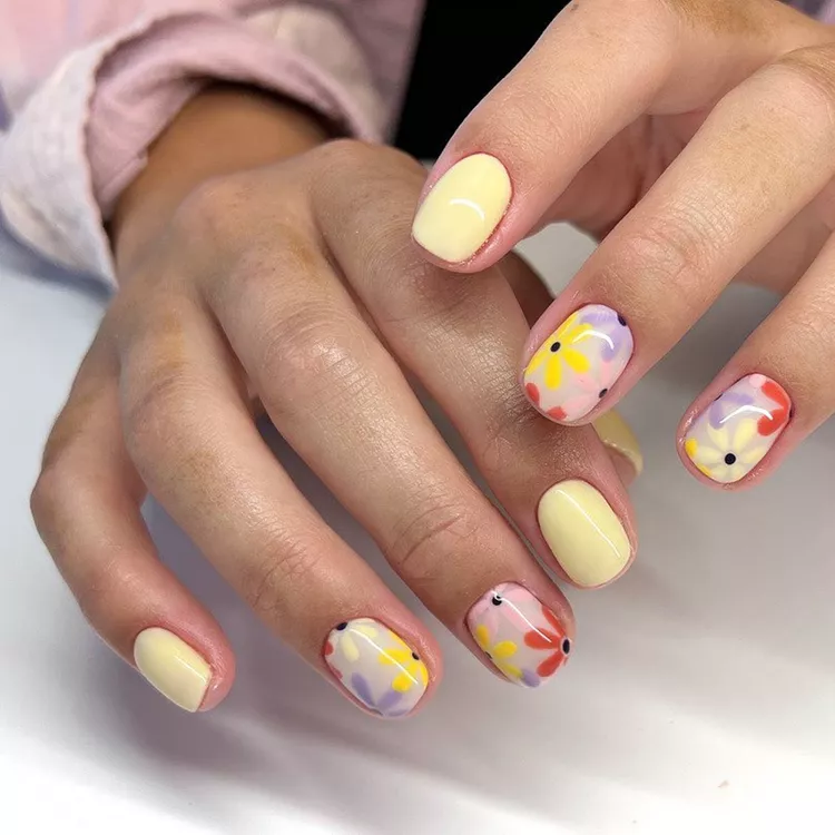 creamy yellow nails with floral for spring