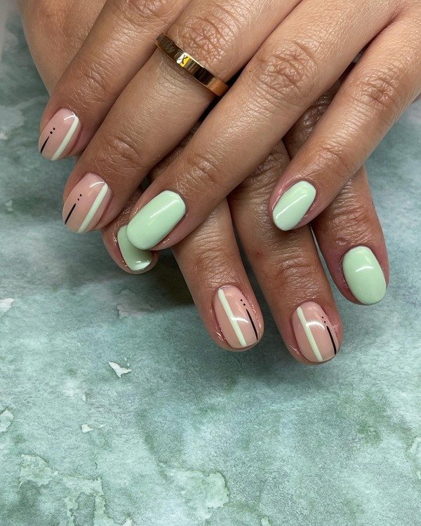 Green pastel and nude base nails for spring