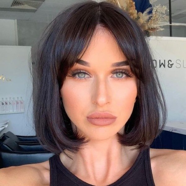A bob cute with a curtain bang that farme the face. If you want a trendy short porm hairstyle give this bob cut a try.