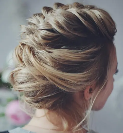 Stunning short hairstyle for prom messy updos with braids. If you want a hairstyle that is classy but modern you will love this prom hairstyle for short hair.