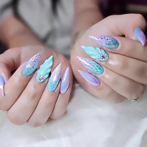. Mermaid Scale Nails done ons tiletto shape nails. Colorful and pretty deisgn