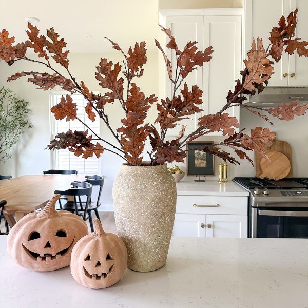 halloween kitchen decor spooky carved pumpkin idea
