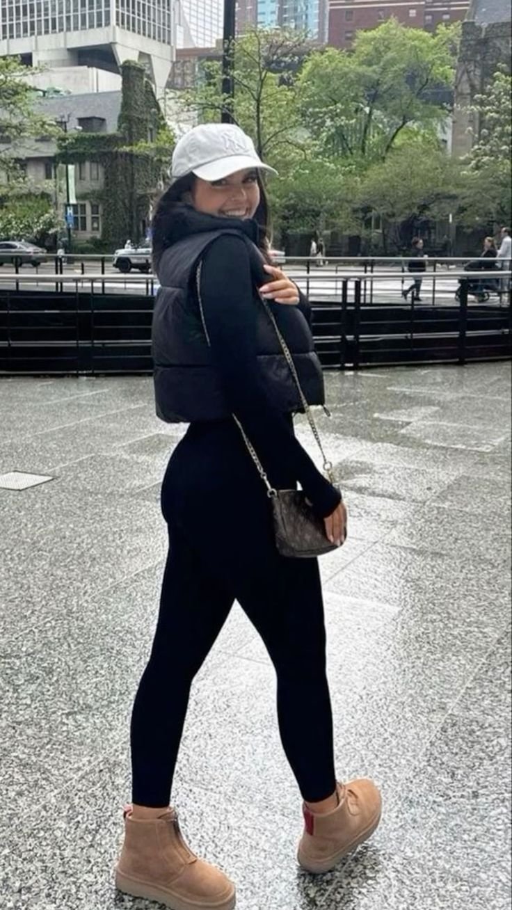 Short Sweater Vest with Black under shirt and Black Leggings