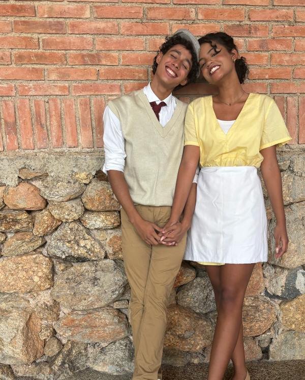A beautiful reimagining of Princess Tiana and Prince Naveen by a Black couple, featuring a green ball gown and royal attire. Their costume celebrates love, transformation, and Black fairytale magic.