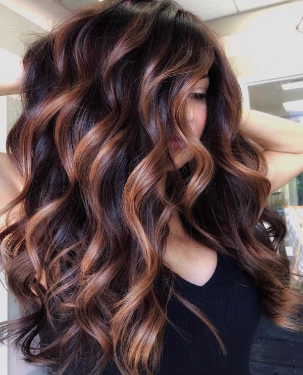 dark brown hair with copper highlights