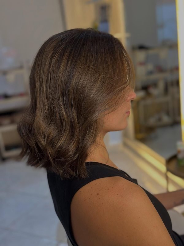 natural looking dark brown baby highlight on dark hair