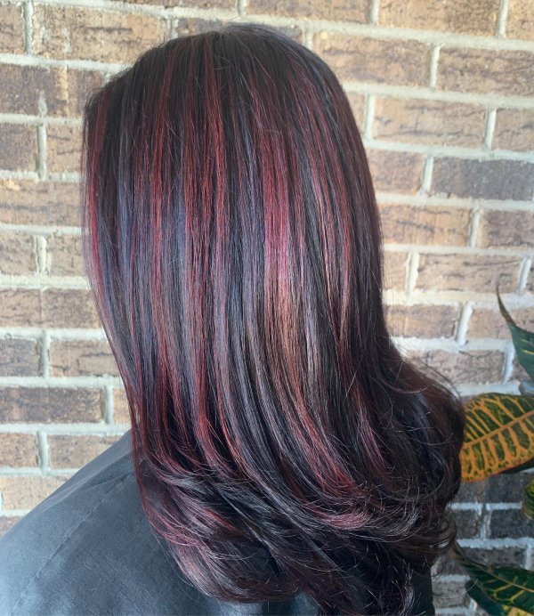 Burgundy Highlights streaks on black dark hair