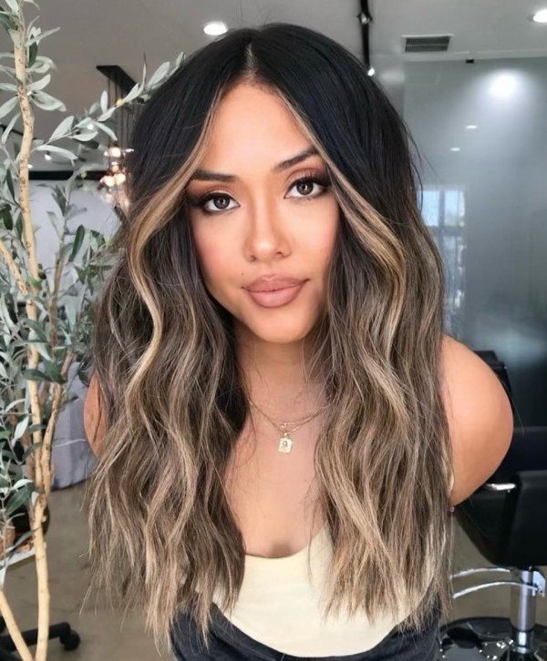 dark brown hair with highlights