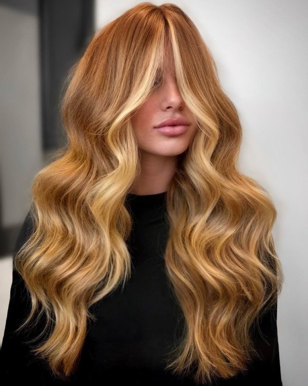 Strawberry blonde hair with highlights