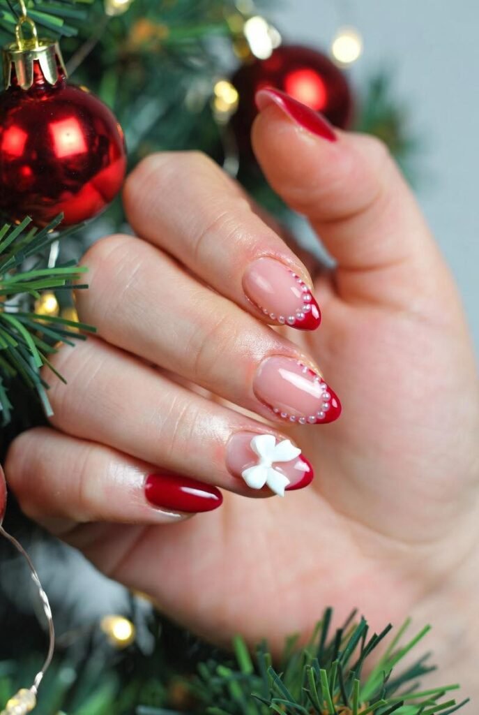 Pearl tip lining nail with white bow. Cute and pretty Chrsitmas nail inspo.