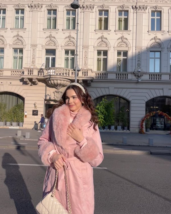 This is a girly winter classy outfit look with headband and pink coat.