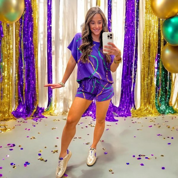 Matching purple two-piece set styled as a festive Mardi Gras outfit.