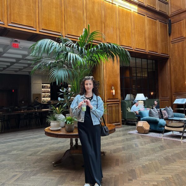 Midi slip dress with denim jacket casual concert outfit idea for women over 40