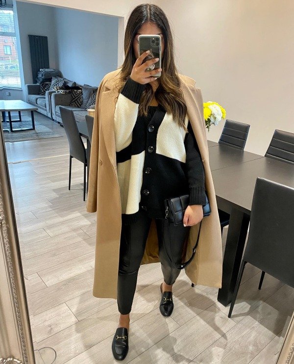 Faux leather leggings with oversized blouse edgy concert outfit idea